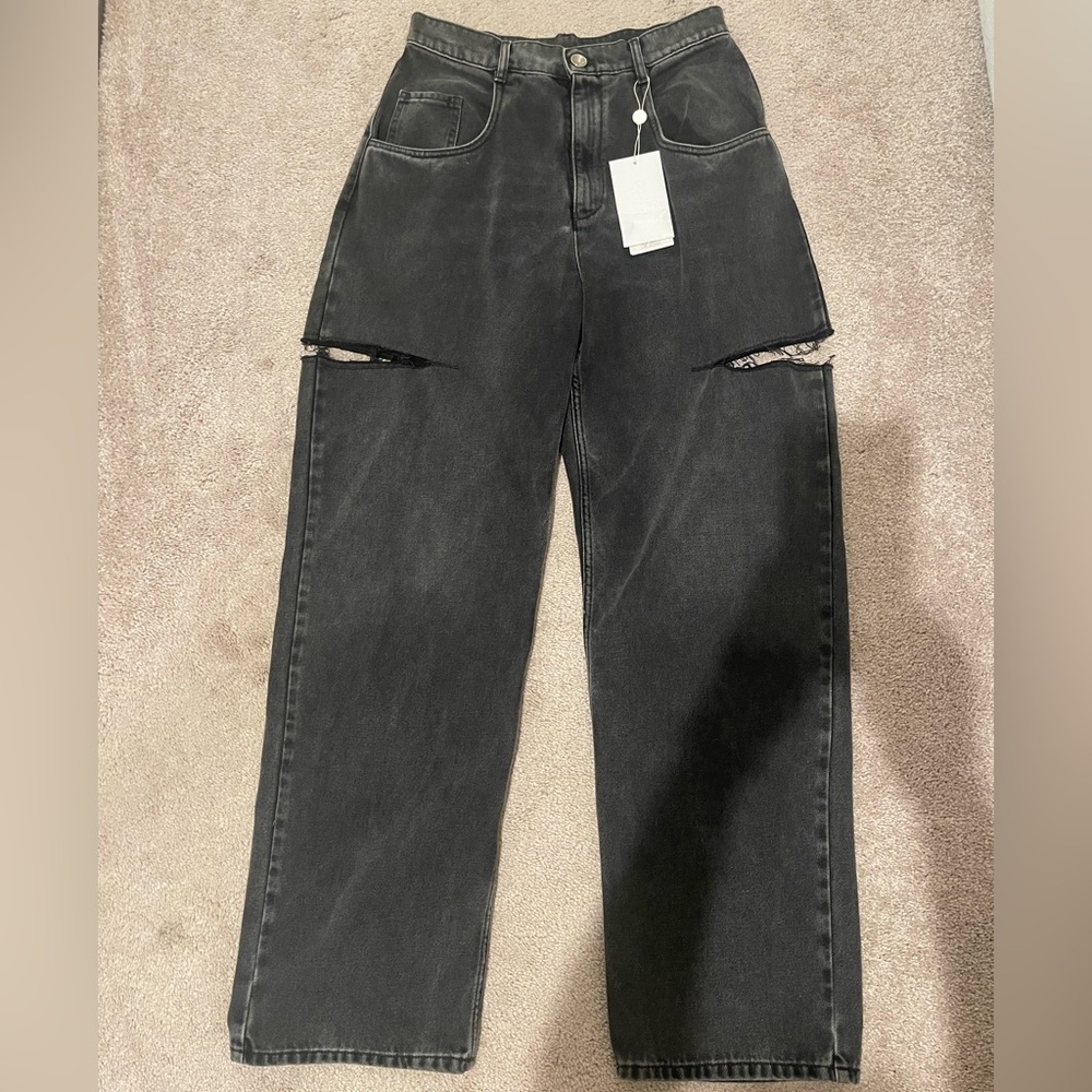 MAISON MARGIELA
Black Cut-Out Jeans (Brand New)